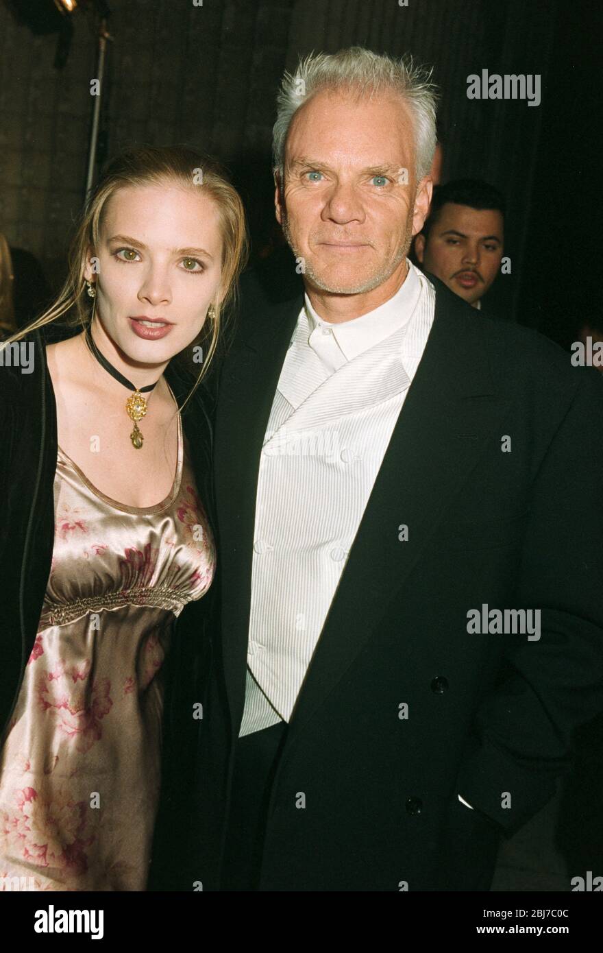 LOS ANGELES, CA. c. 1995: Schauspieler Malcolm McDowell & Ehefrau Kelley McDowell. Foto © Paul Smith/Featureflash Stockfoto