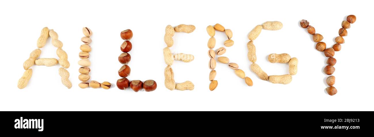 WORTALLERGIE mit Nüssen auf weiß isoliert gemacht Stockfoto