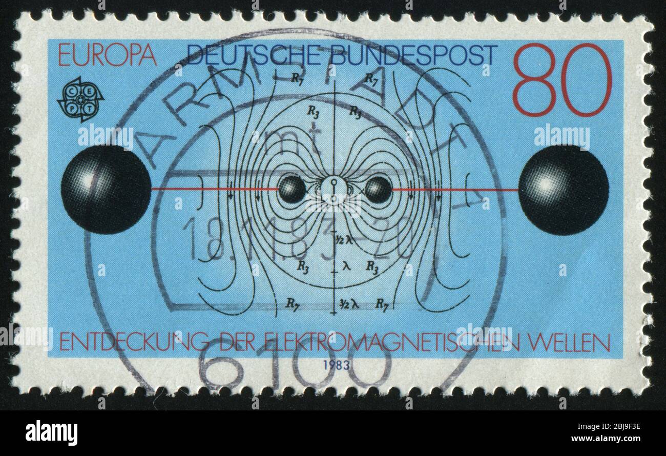 DEUTSCHLAND- UM 1983: Briefmarke gedruckt von Deutschland, zeigt elektromagnetische Wellen, um 1983. Stockfoto
