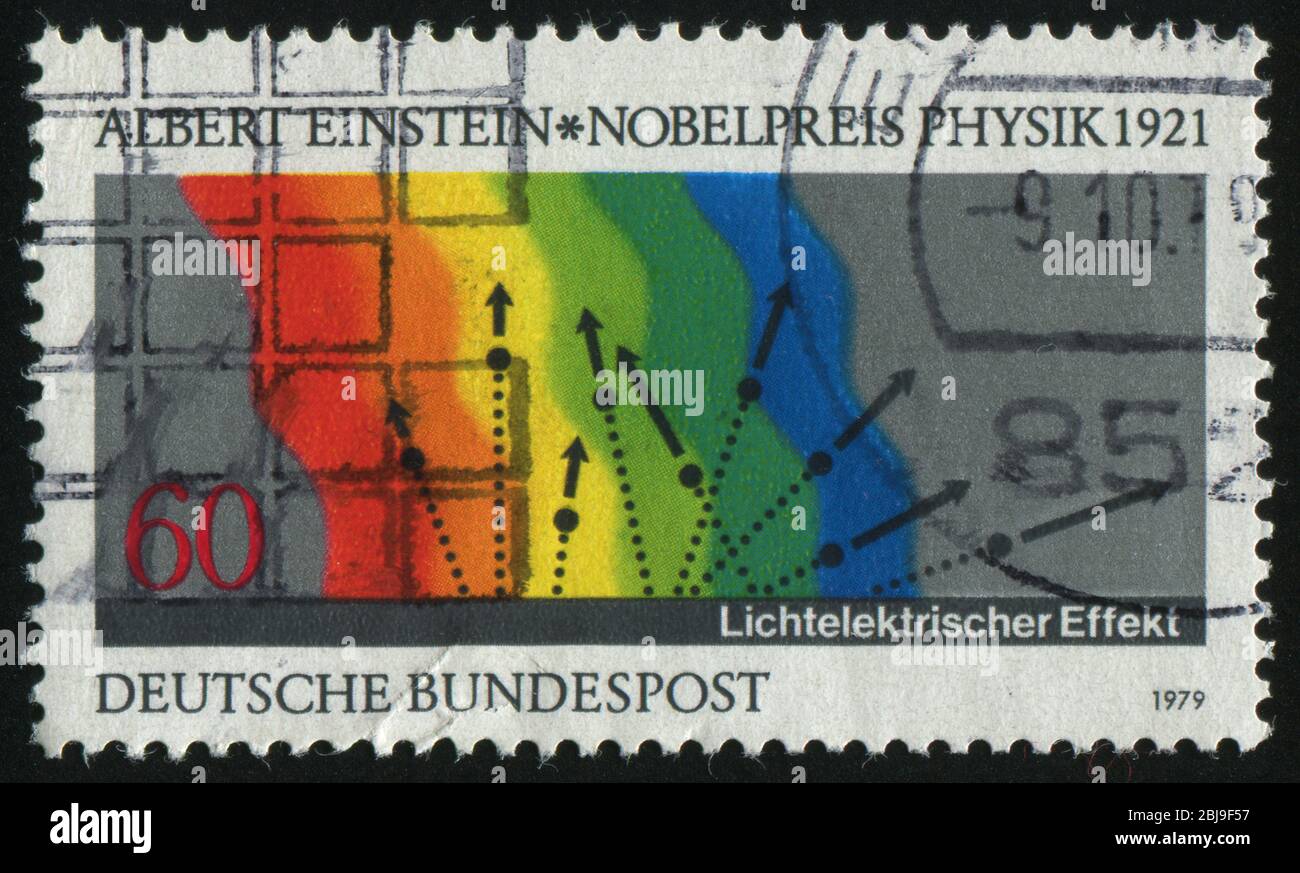 DEUTSCHLAND- UM 1979: Briefmarke gedruckt von Deutschland, zeigt Diagramm von Einsteins photoelektrischem Effekt, um 1979. Stockfoto