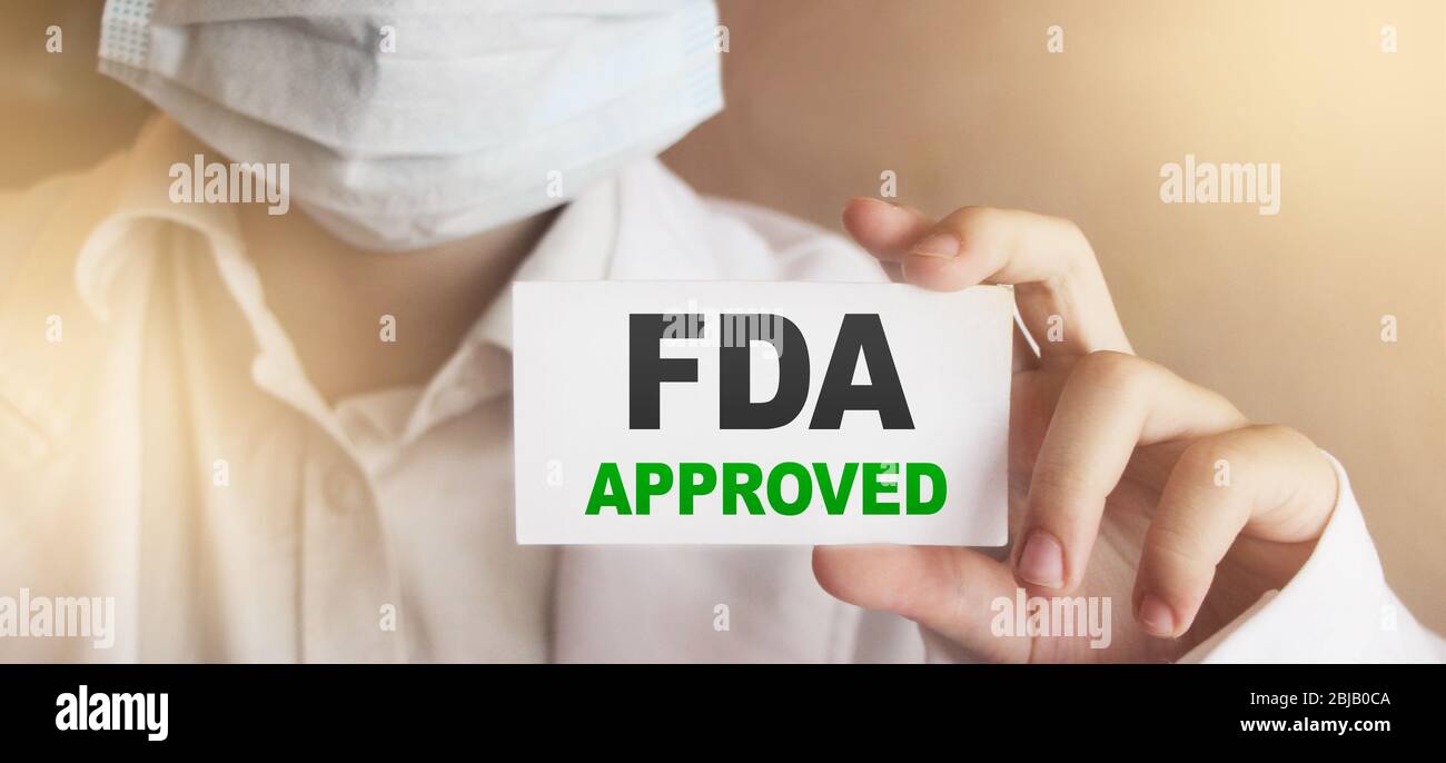 FDA genehmigte Wörter auf Karte Doktor zeigt. Food and Drugs Association Approved Products Concept Stockfoto