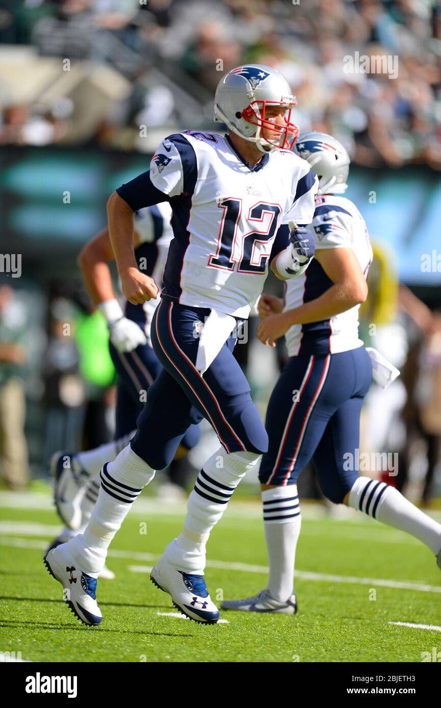 20. Oktober 2013: New England Patriots Quarterback Tom Brady (12) läuft nach einem Touchdown Pass in der ersten Hälfte einer Woche 7 AFC Downfield Stockfoto