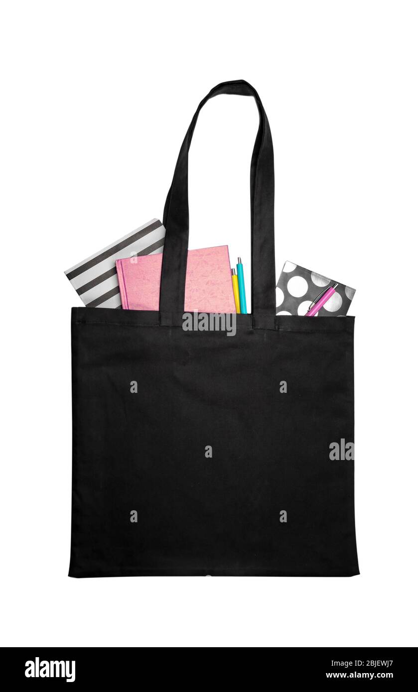 Schwarze Tasche mit Schreibwaren auf weißem Hintergrund Stockfoto