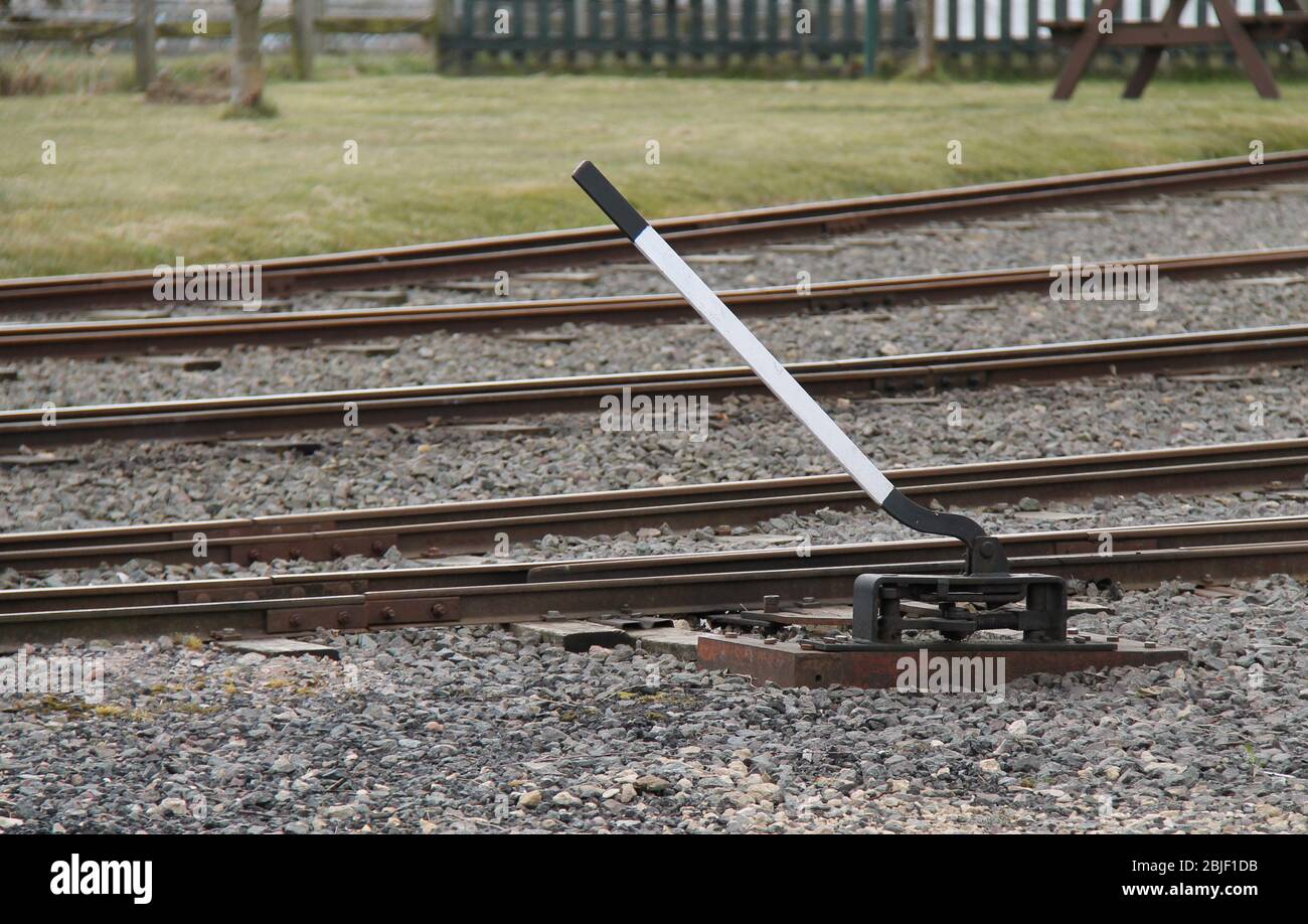 Ein manuell betriebener Bahnzug-Spurstaupen-Hebel. Stockfoto