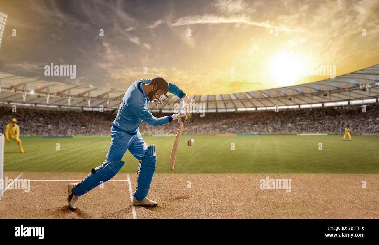 Batsman verteidigt einen Ball während eines Spiels im Stadion Stockfoto