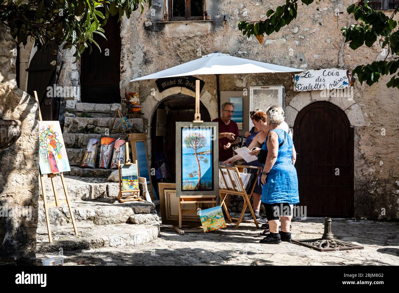 Kunst zum Verkauf in der mittelalterlichen Dorf Eze, Cote d'Azur, Provence, Frankreich. Stockfoto