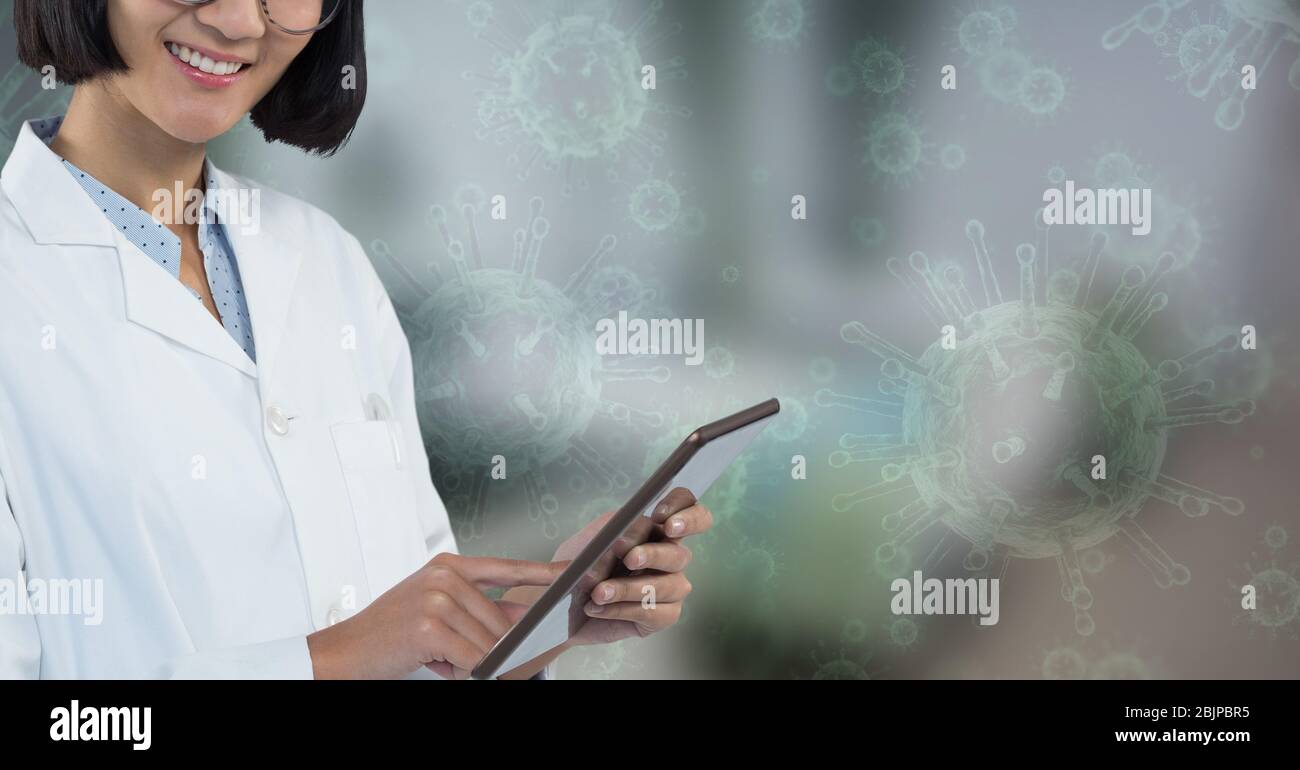 Digitale Darstellung eines Arztes mit einem digitalen Tablet über Coronavirus Covid19 Zellen Stockfoto
