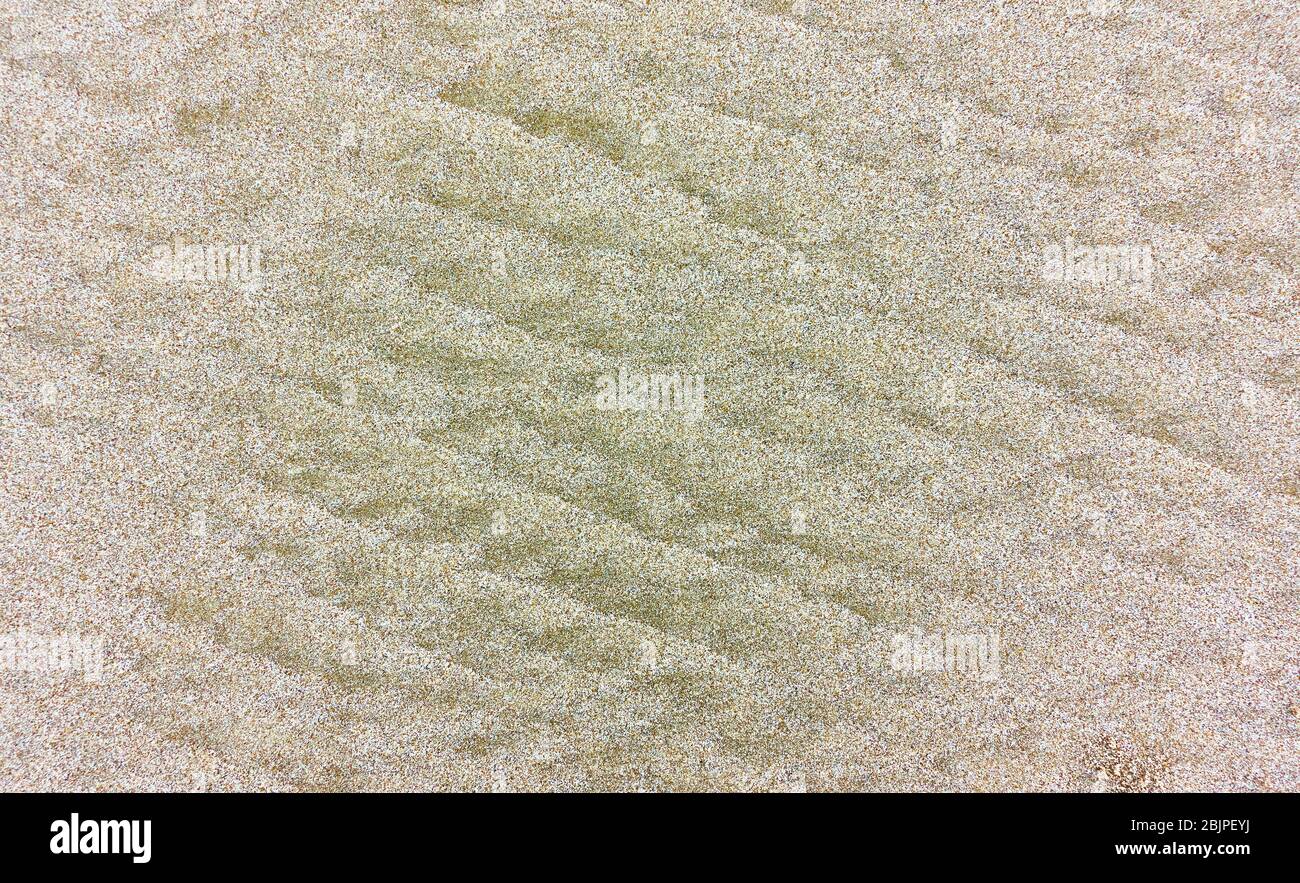 Gewellte Meersand Oberfläche - natürliche abstrakte Textur Stockfoto