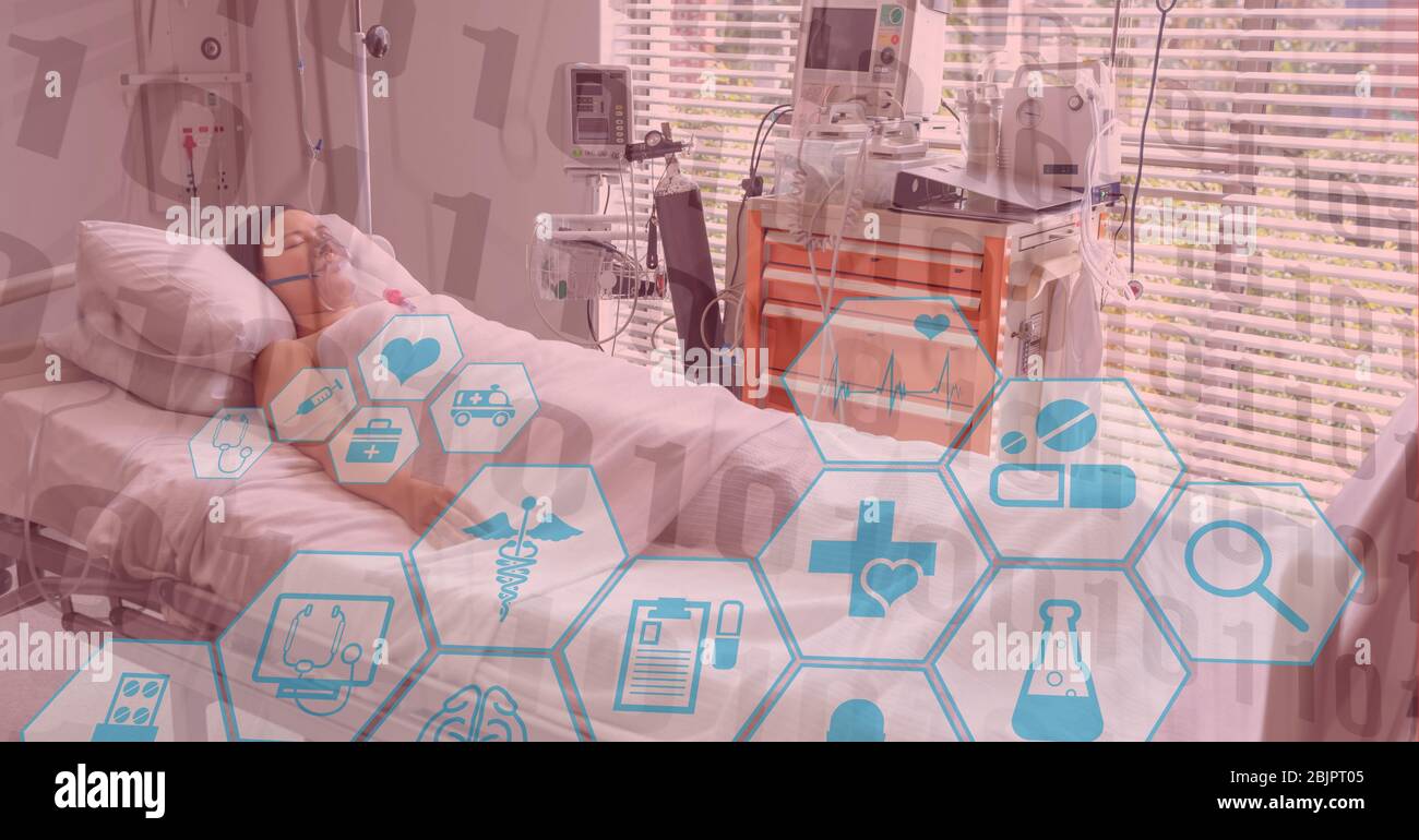 Digitale Darstellung eines Patienten, der in einem Krankenhausbett über medizinischen Symbolen liegt Stockfoto