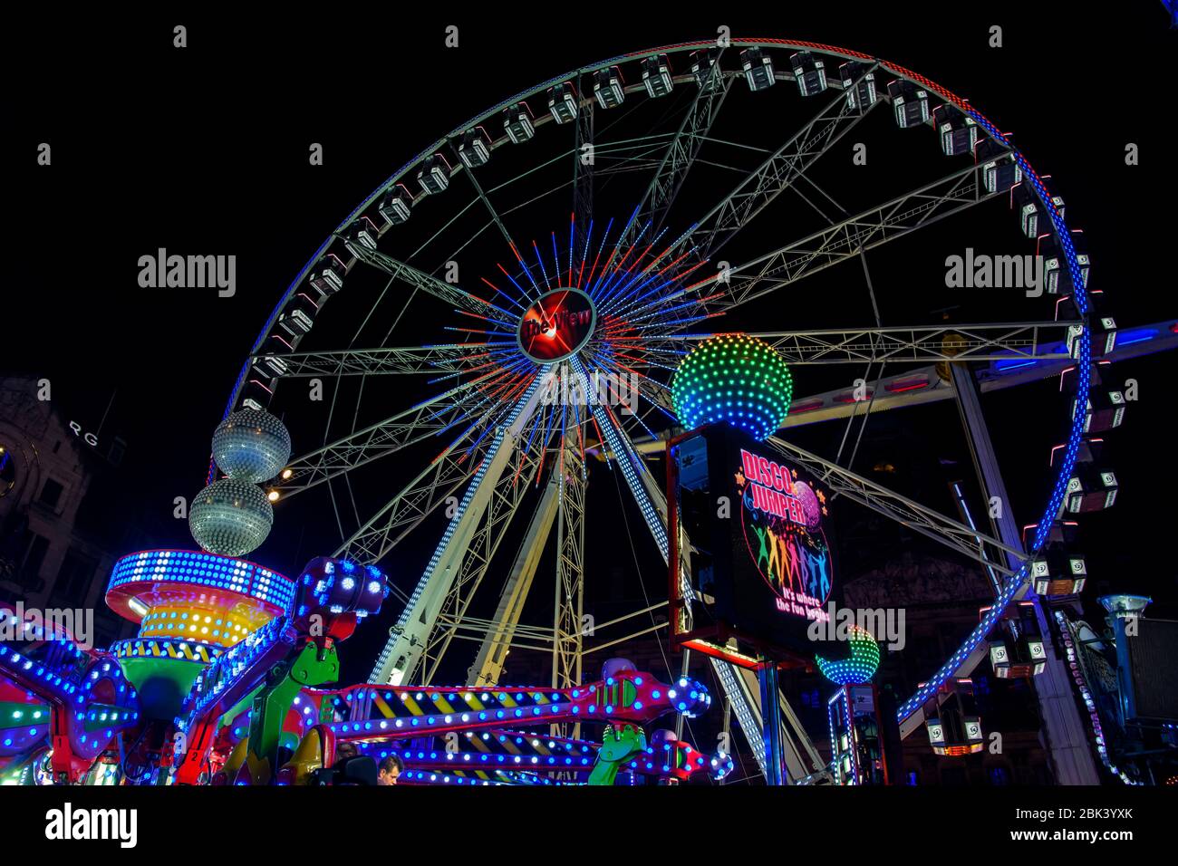 Dam Square Fun Fair Karneval Fahrten bei Nacht, Amsterdam, Nordholland, Niederlande Stockfoto
