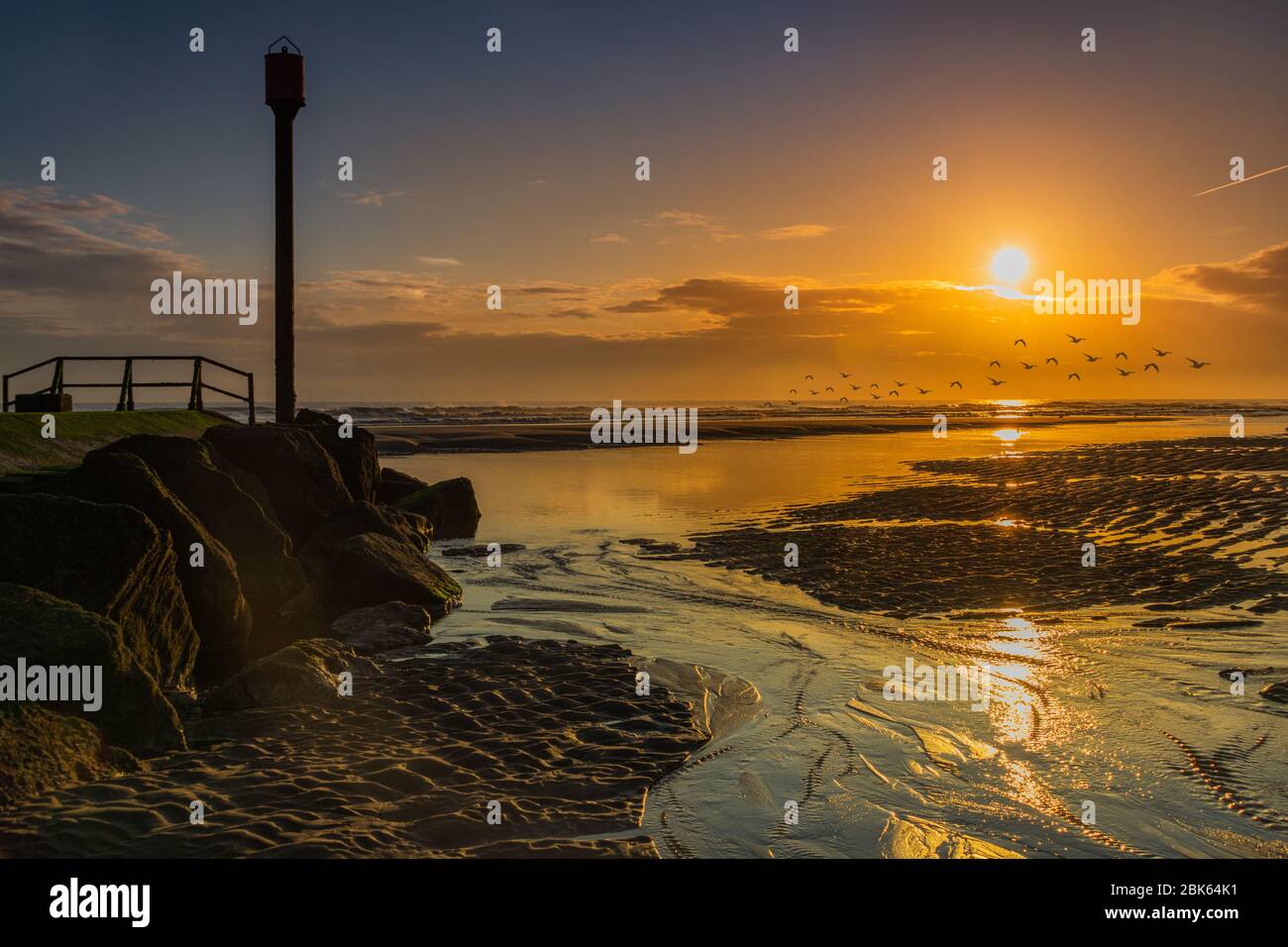 Sonnenaufgang an der Lincolnshire Coast, Anderby Creek. Stockfoto