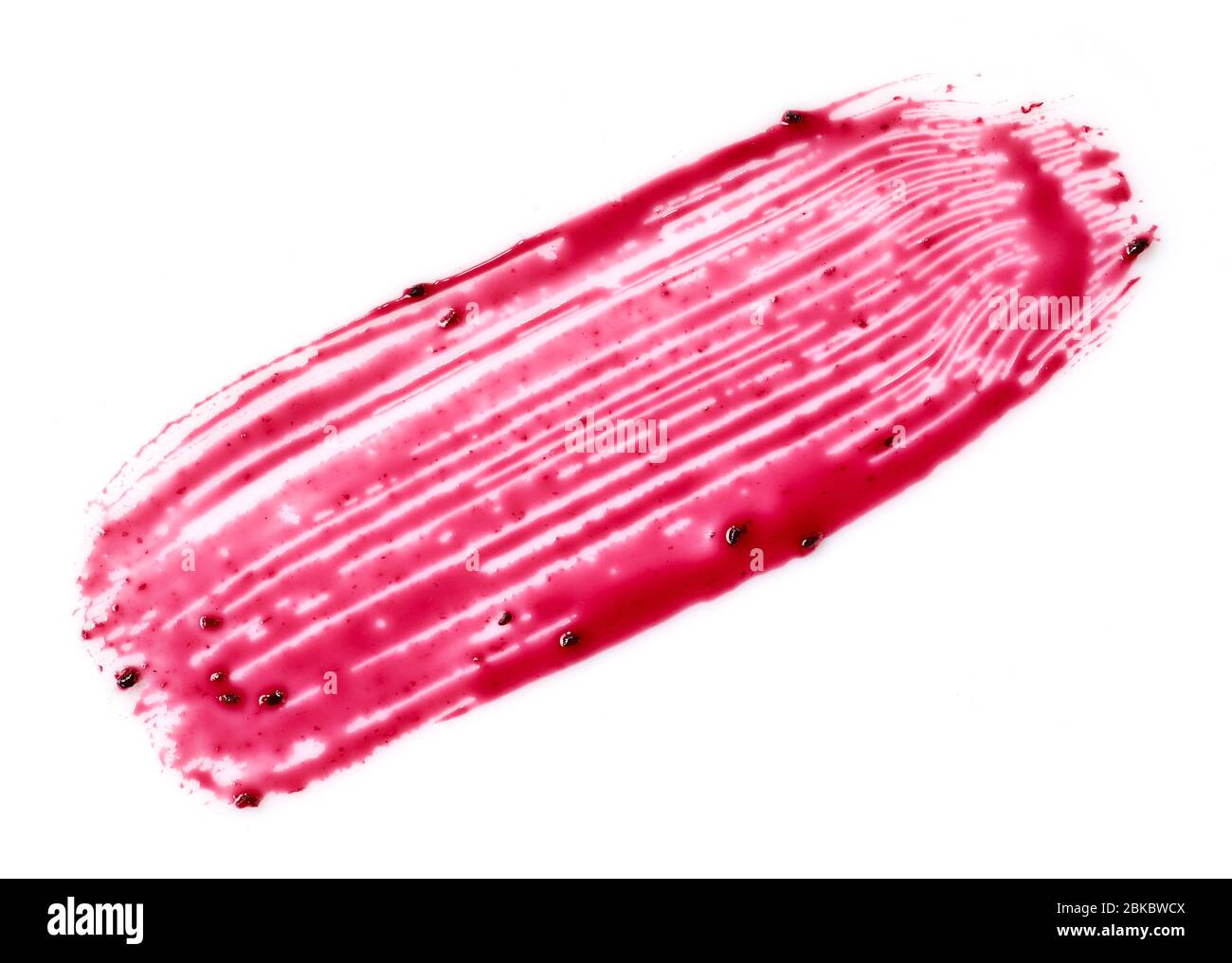 Schwarze Johannisbeersauce isoliert auf weißem Hintergrund, Draufsicht Stockfoto