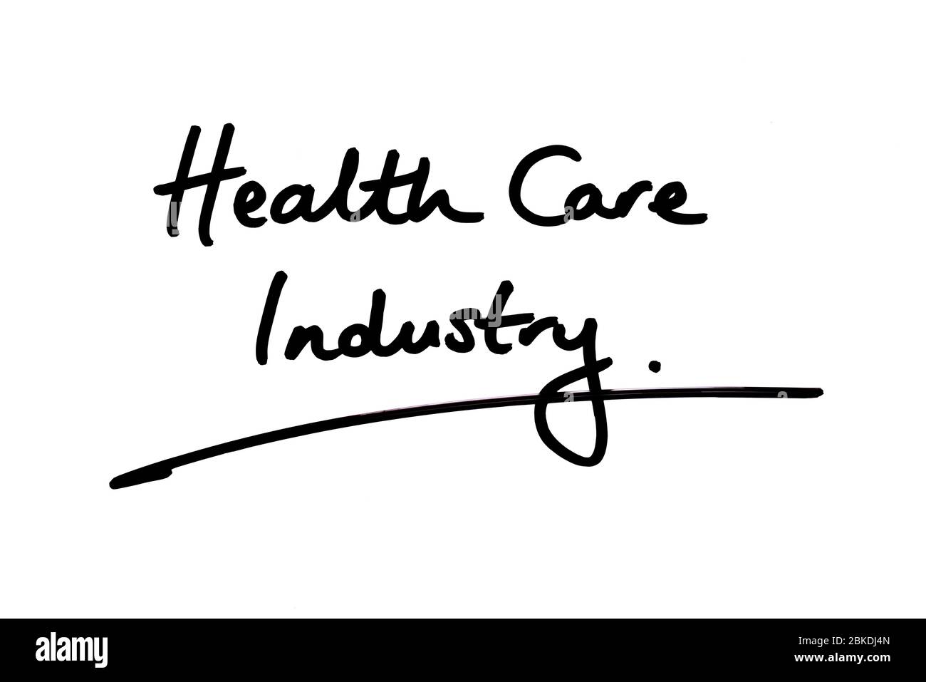 Gesundheitswesen Industrie handschriftlich auf einem weißen Hintergrund. Stockfoto