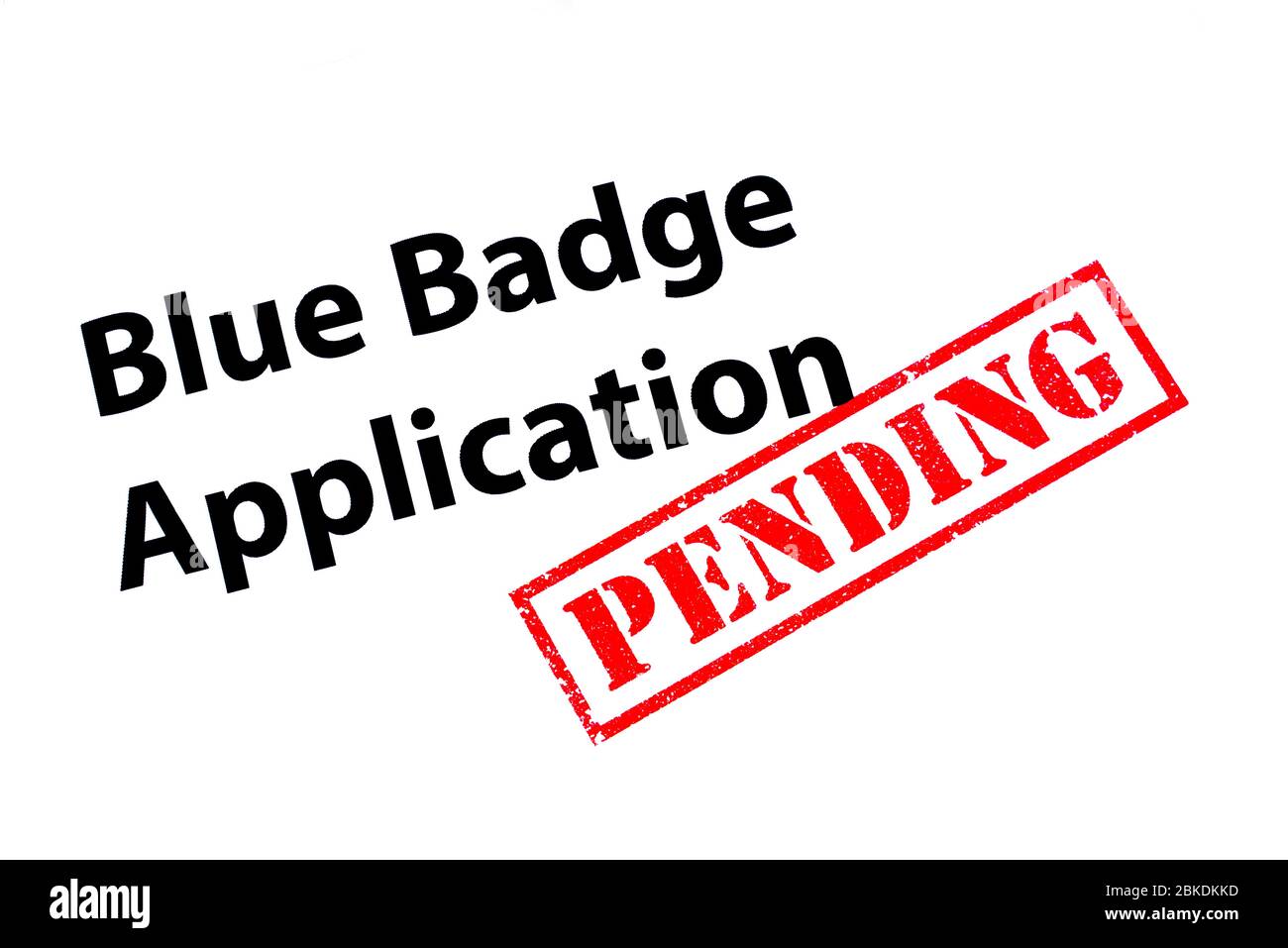 Blaue Badge Application Überschrift mit einem roten AUSSTEHENDEN Gummistempel. Stockfoto