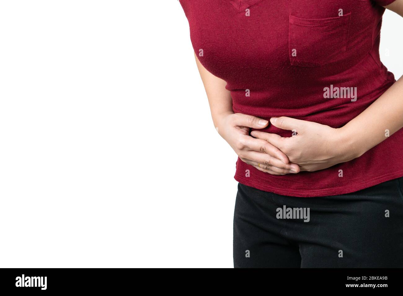 Magenschmerzen, junge Frau, die an Bauchschmerzen Gefühl Symptom von pms auf weißem Hintergrund Stockfoto