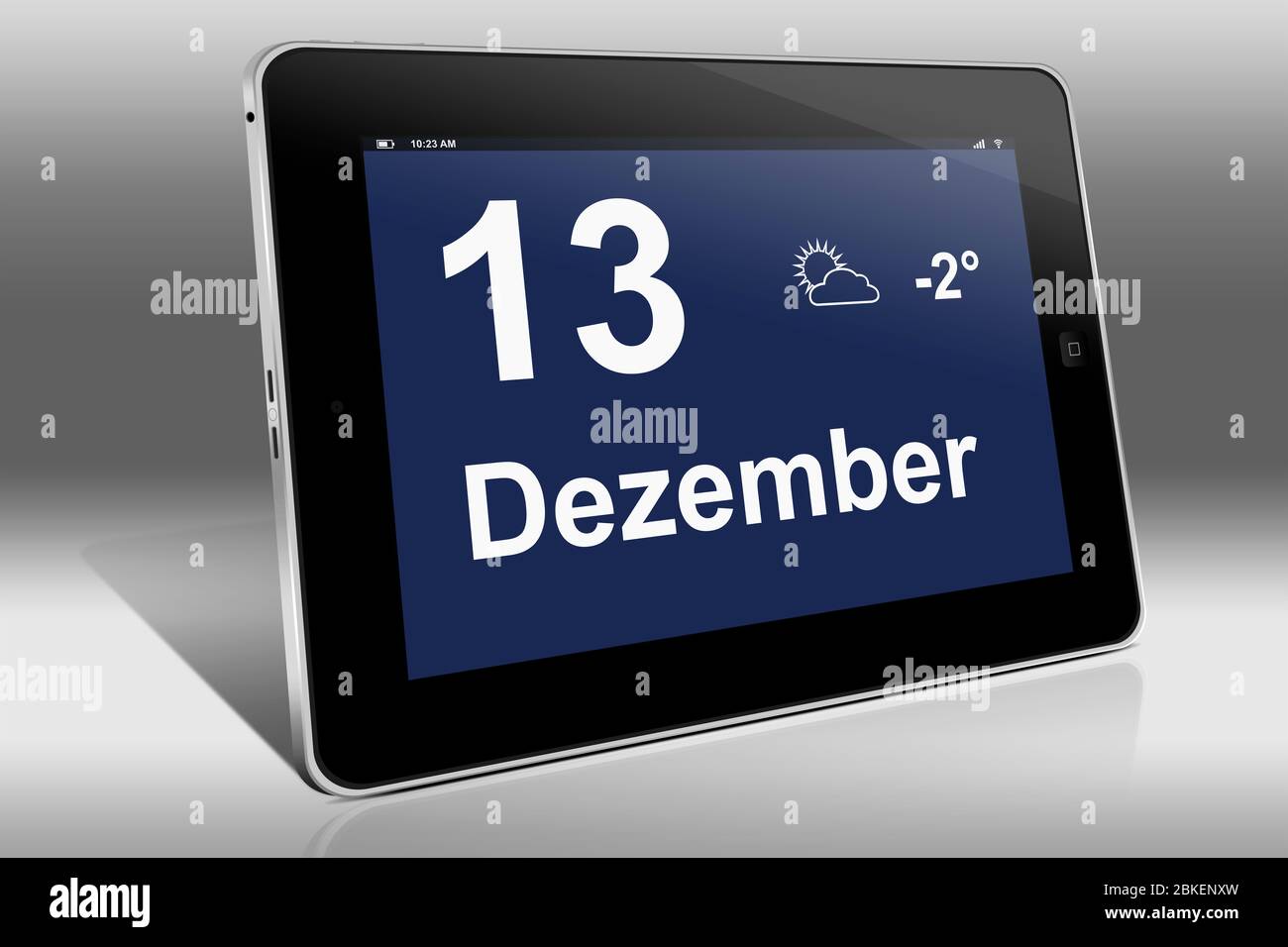 Ein Tablet-Computer zeigt einen Kalender in deutscher Sprache mit dem Datum 13. Dezember an. Ein Tablet-Computer zeigt das Datum 13 an. Dezember Stockfoto