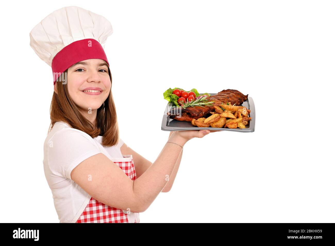 Mit Schweinerippchen am Teller kochen Stockfoto