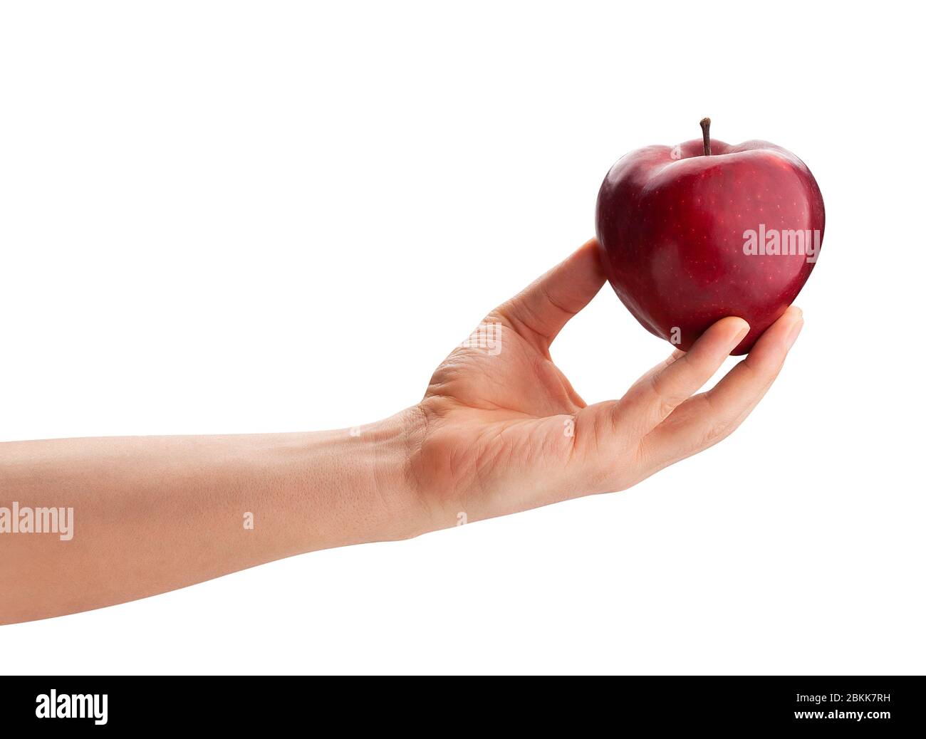 In Scheiben geschnitten roten köstlichen Apfel in der Hand Weg isoliert auf weiß Stockfoto