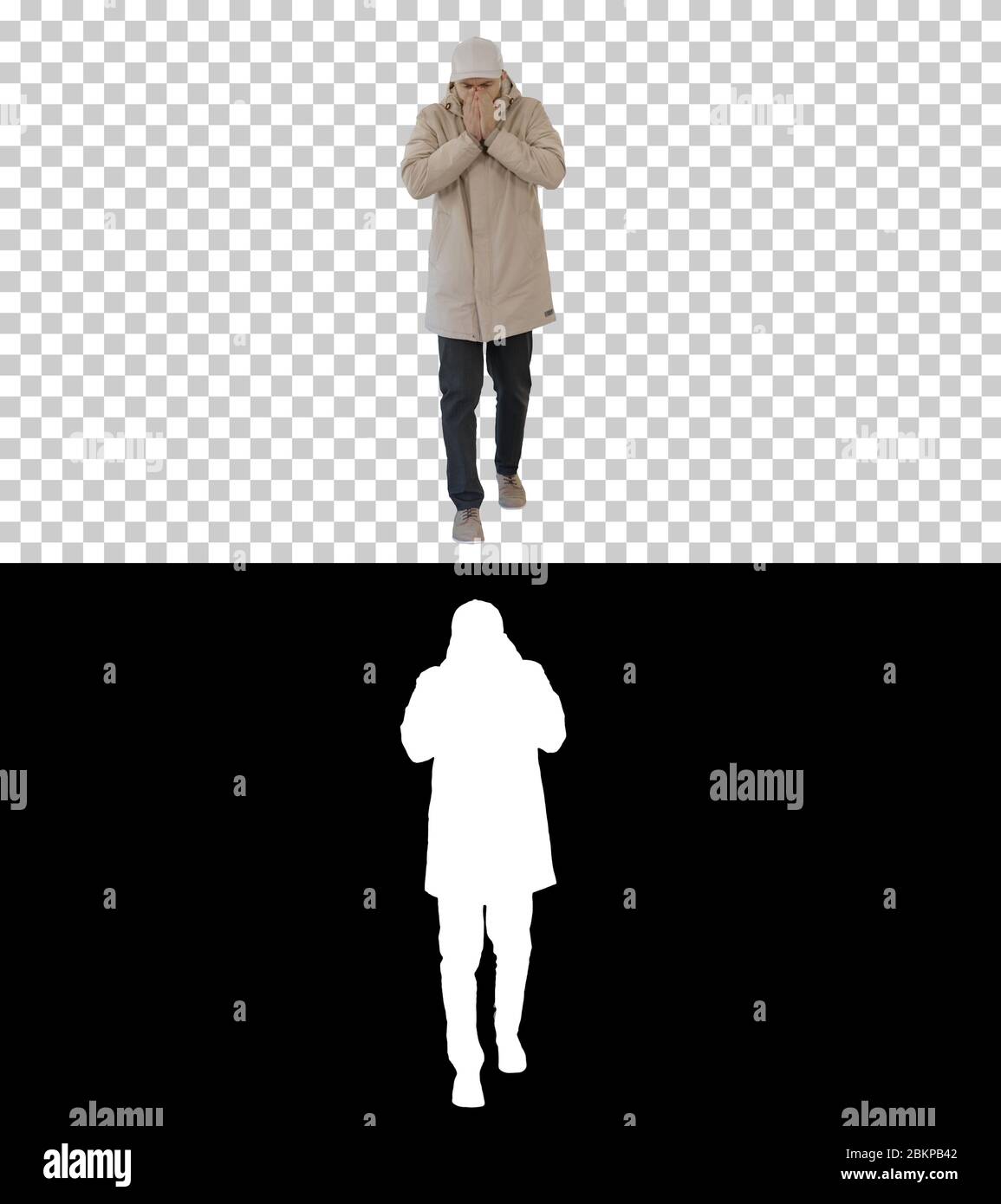 Mann im Winteroutfit Wandern und Husten, Alpha Channel Stockfoto