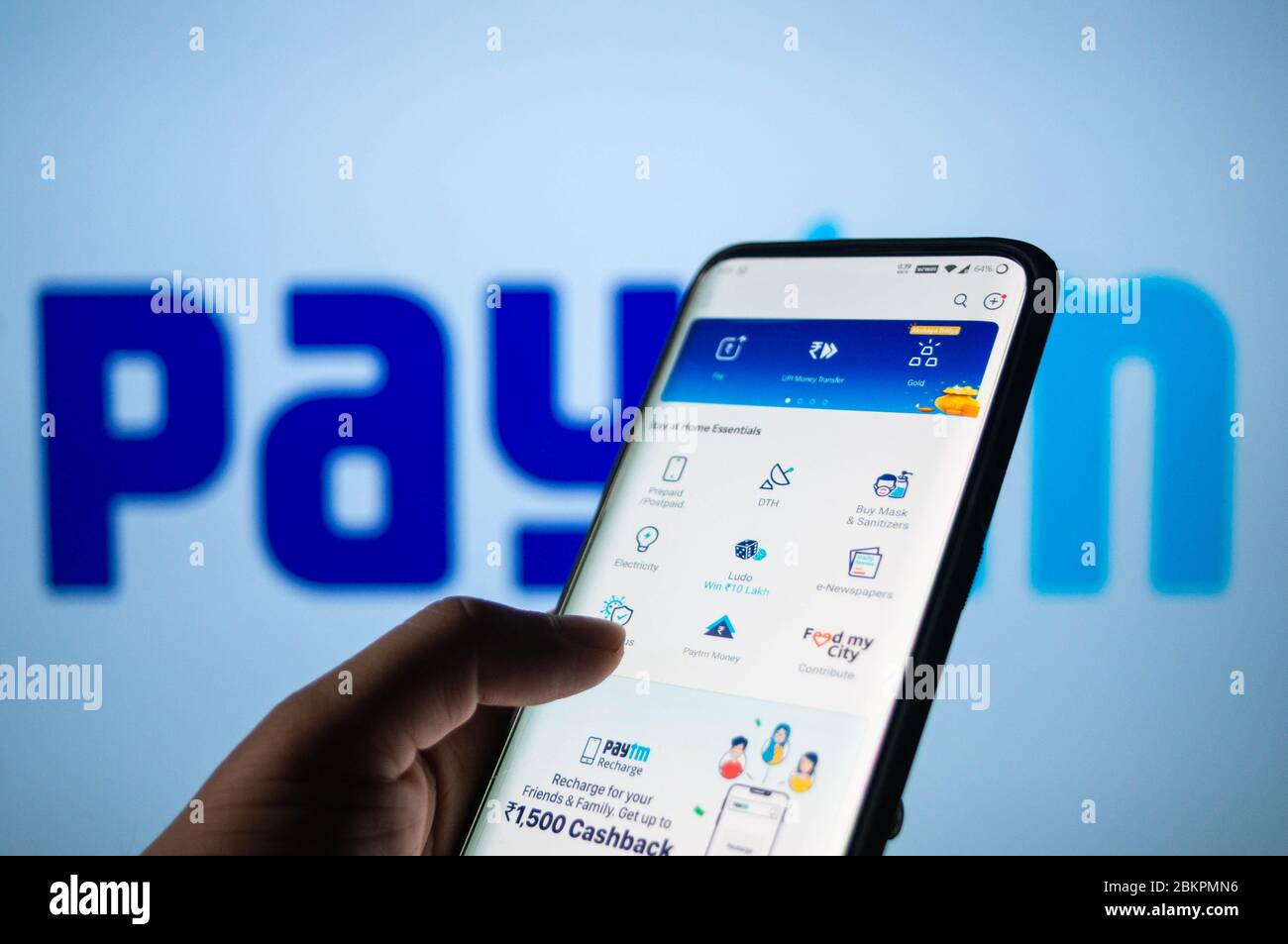 Jaipur, India , circa 2020 - Paytm App Home Screen Logged in on a mobile phone with paytm written on a Whit Board in the background Stockfoto