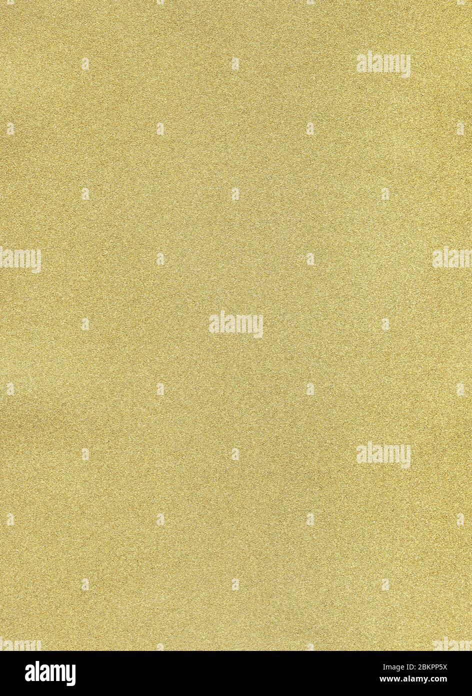 Gold Papier Textur Hintergrund. Vertikales Format. Freier Platz für Ihren Text. Gold funkelnde festliche Hintergrund, Nahaufnahme. Feine runde Textur. Granulare Stockfoto