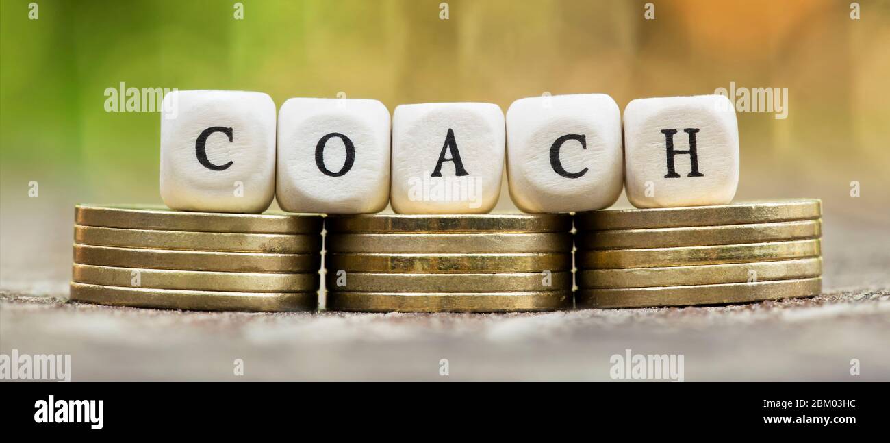 Business Life Coaching Konzept - Web-Banner von Geld Münzen mit Buchstaben Stockfoto