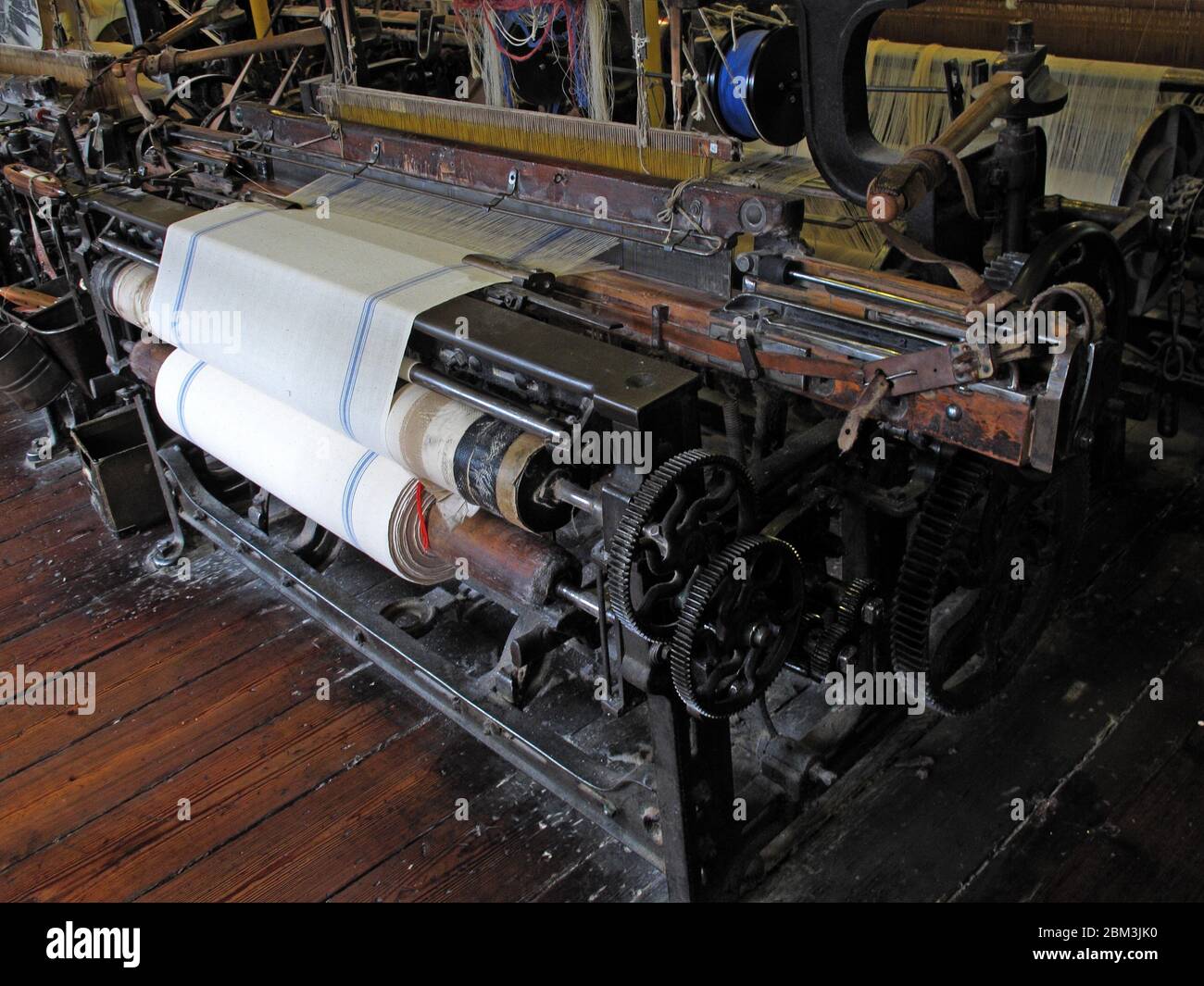 Innerhalb einer Manchester Cotton Mill, Cottonopolis, Herstellung von Baumwolle und Tuch, Baumwollwebstuhl, Webmaschine Stockfoto