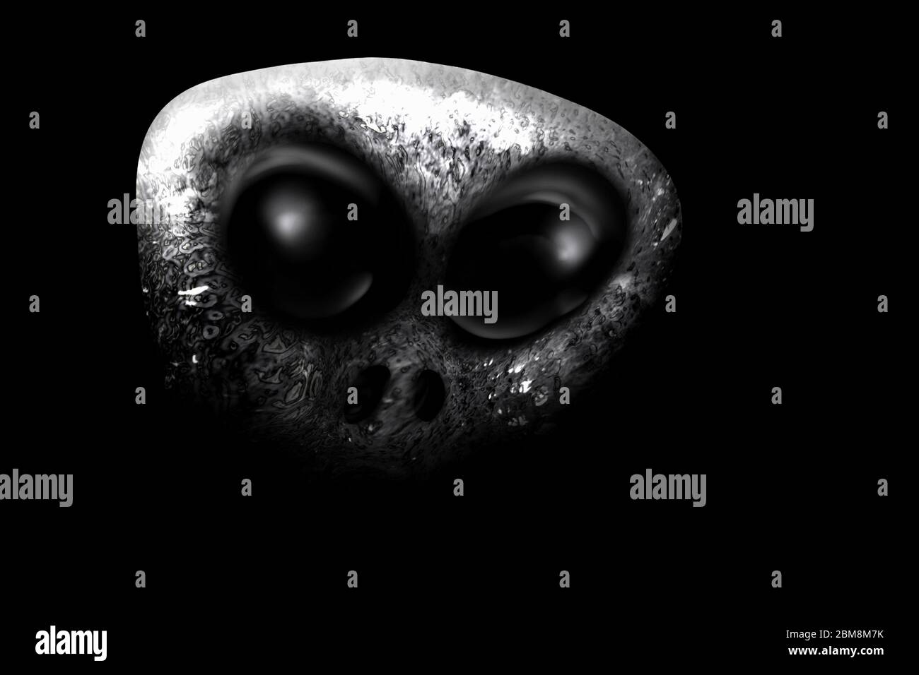 Alien Gesicht isoliert auf schwarzem Hintergrund. Stockfoto