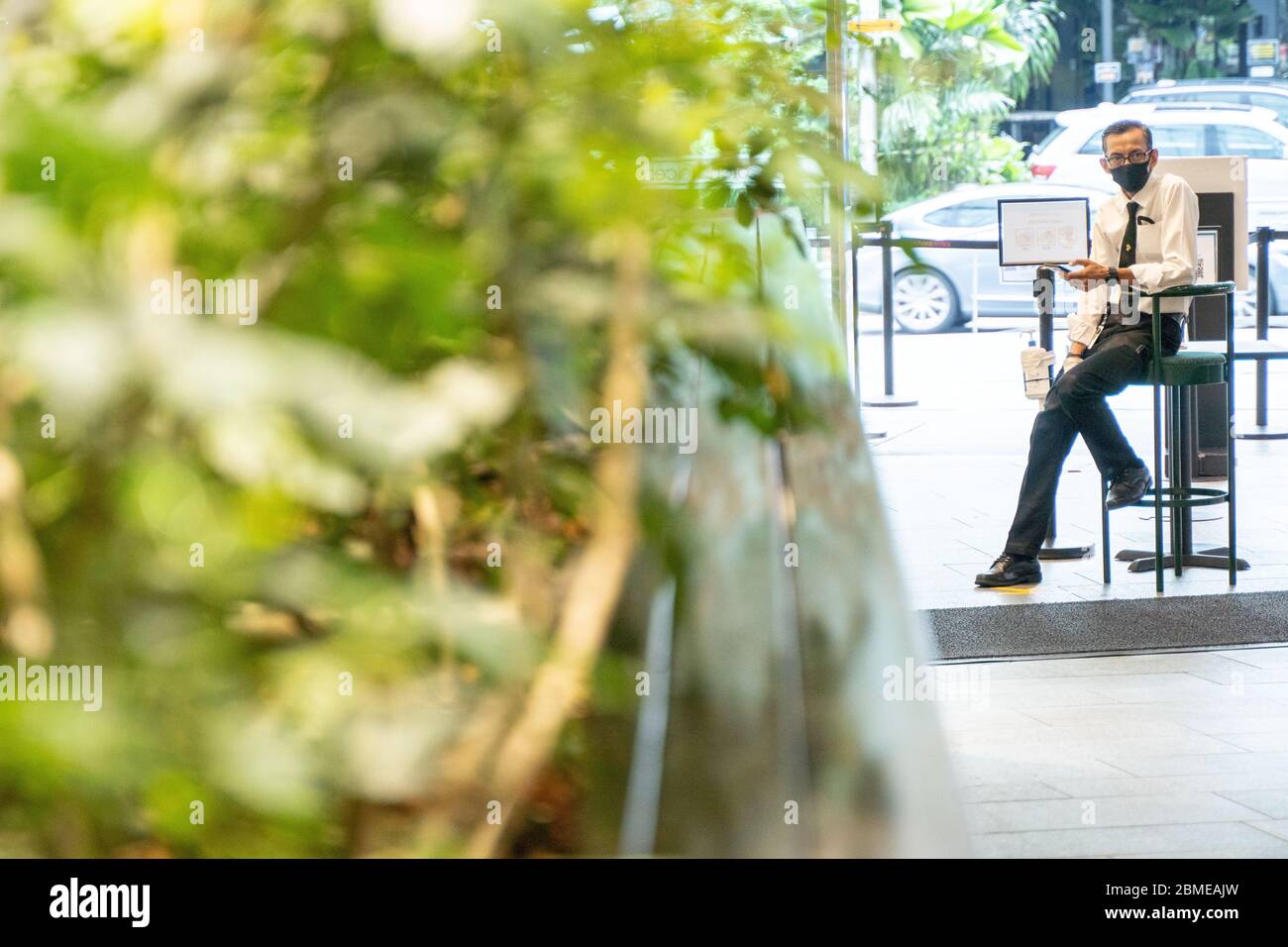 Sicherheitswächter ruht während 19 Maßnahmen Stockfoto