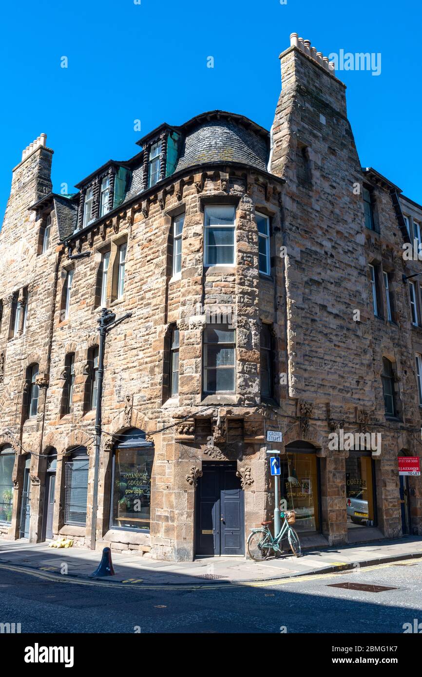 Altes Mietshaus (Grow Urban Plants Shop) an der Ecke Grove Street und Fountainbridge in Edinburgh, Schottland, Großbritannien Stockfoto