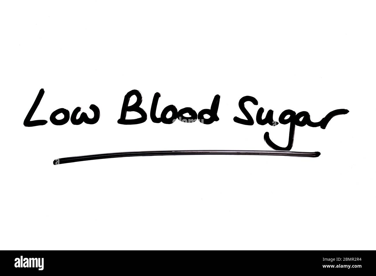 Low Blood Sugar handgeschrieben auf weißem Hintergrund. Stockfoto