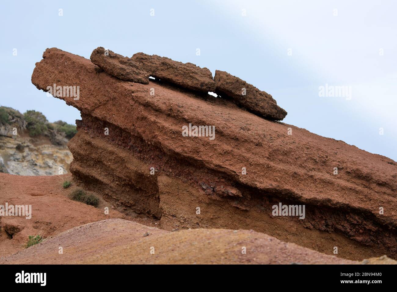 Nahaufnahme von orange-braunen Lavafelsen Stockfoto