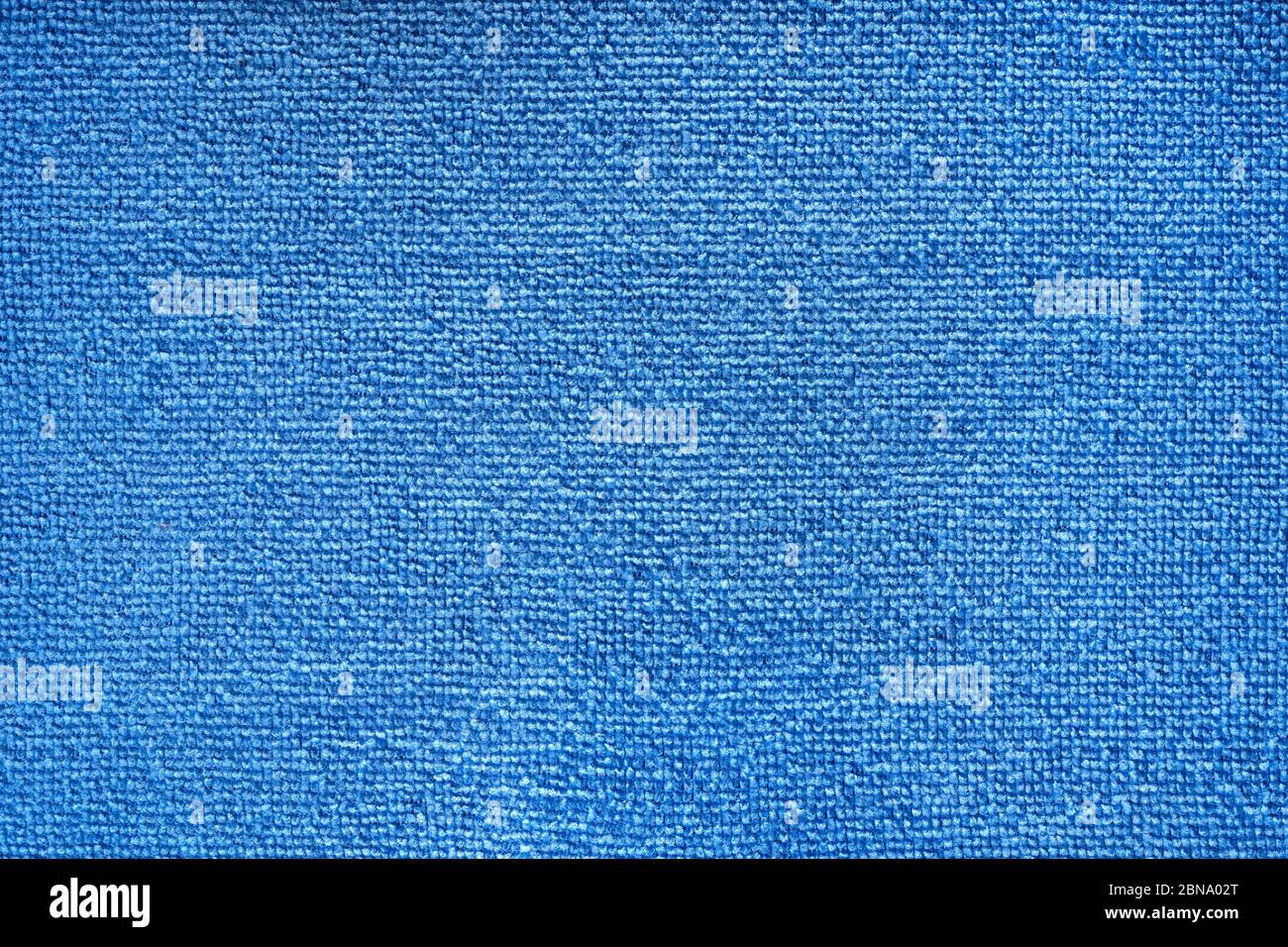Mikrofasertuch blau Frottee Textur Muster. Mikrofaserstoff Tuch mit Nahaufnahme. Stoff Textur Hintergrund. Stoff blaues Muster. Reinigung se Stockfoto