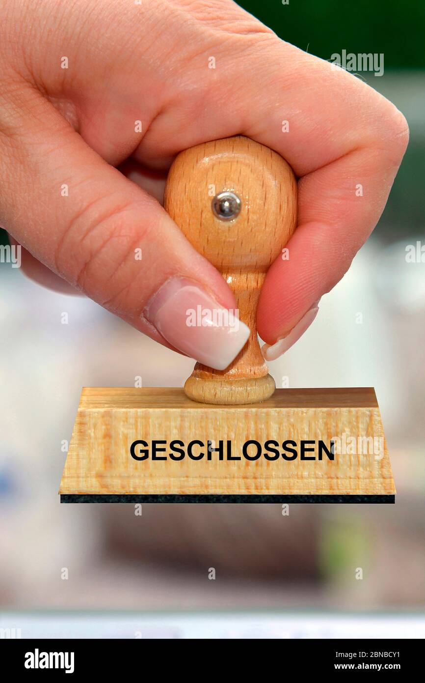 Stempel in der Hand einer Frau Schriftzug geschlossen, close, Germany Stockfoto