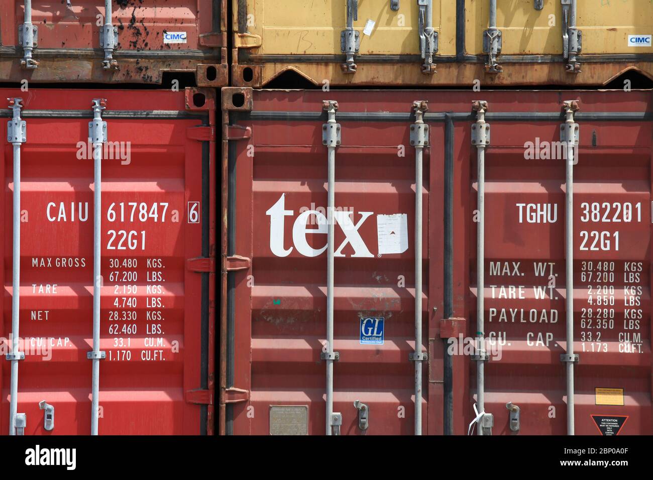 Tex Logo auf einem klassischen gelben Versandcontainer. Stockfoto