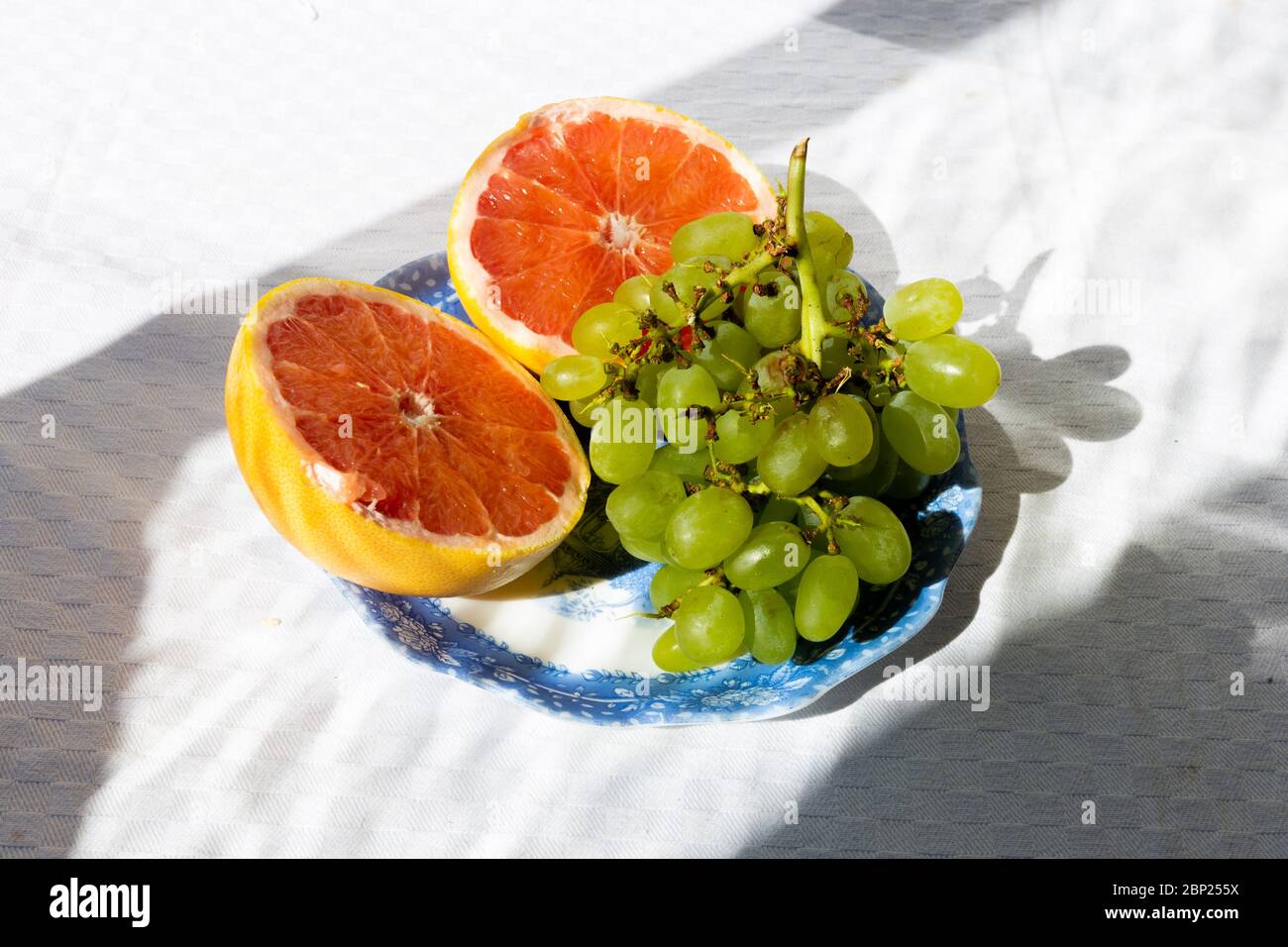 Trauben und Grapefruit Stockfoto
