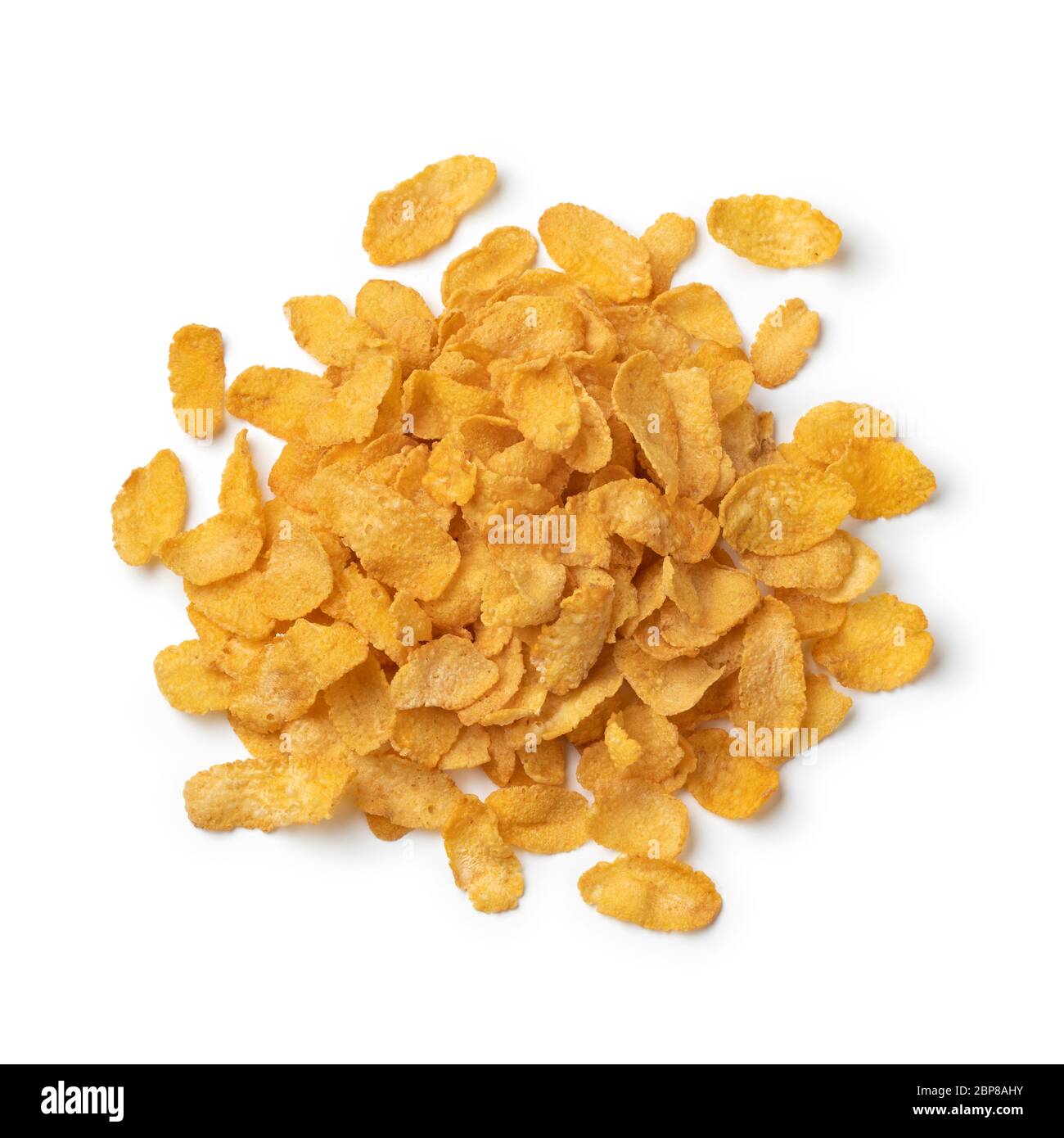 Haufen traditioneller Cornflakes auf weißem Hintergrund isoliert Stockfoto