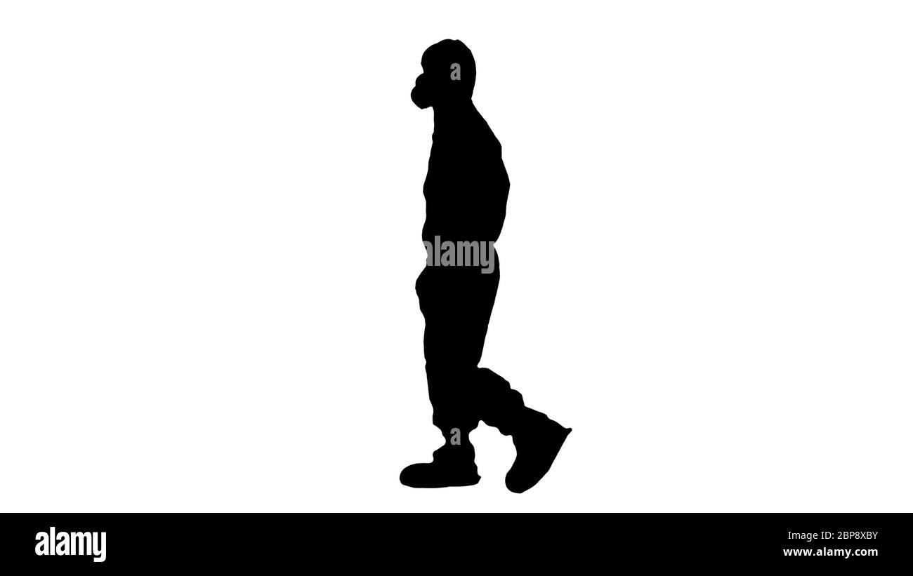 Silhouette Virologe Mann in Schutzkostüm beim ein- und Ausgehen. Stockfoto