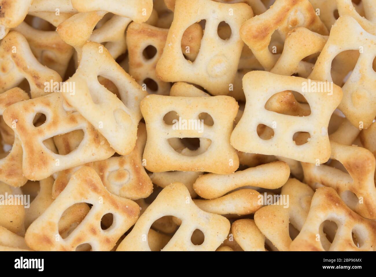 Lustige Cracker (Kekse) glückliche Gesichter Stockfoto