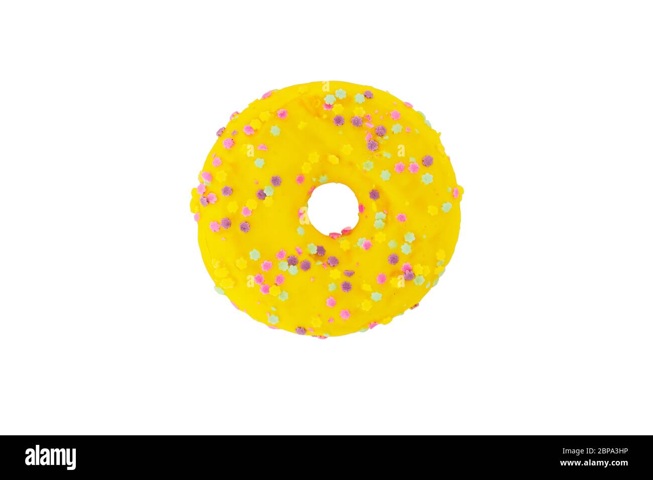 Yummy gelber Donut isoliert auf weißem Hintergrund. Stockfoto