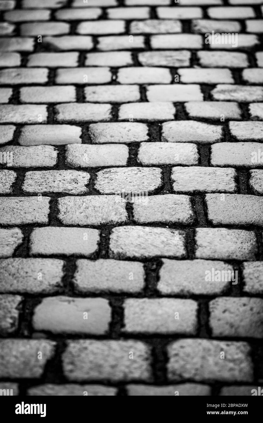 Altes traditionelles europäisches Kopfsteinpflaster-Straßenbild Stockfoto