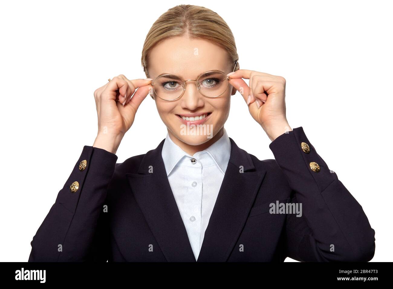 Studio erschossen der junge fröhliche Frau Bund eyeglass Frames. Stockfoto