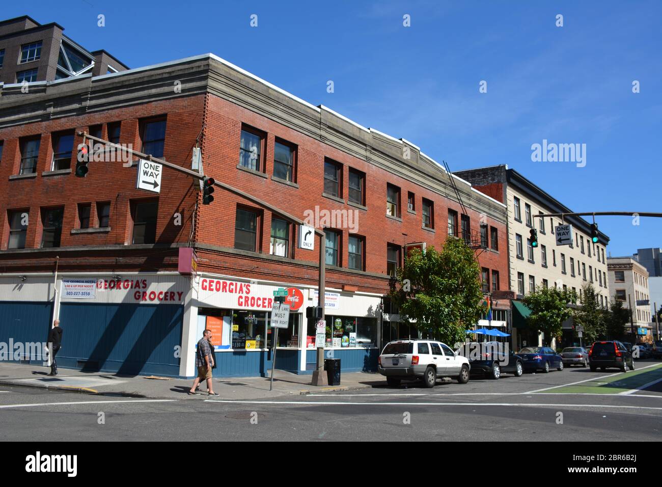 Das historische Gebäude des Georgia Hotels mit roten Backsteinen in der 308 SW 12th Ave (und Ecke SW Harvey Milk St) Stockfoto