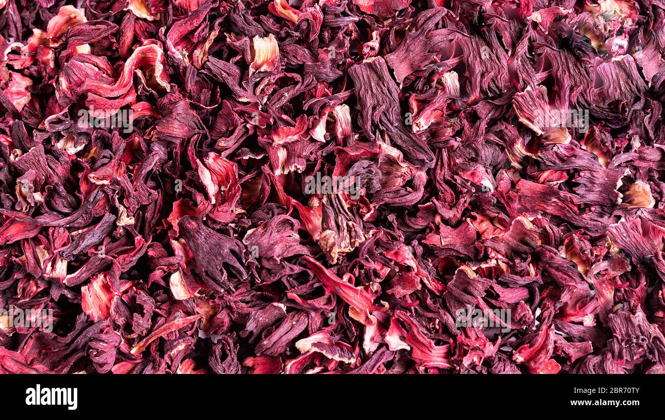 Trocken roten Kräuter Hibiskus Karkadenblatt Tee als Hintergrund. Stockfoto