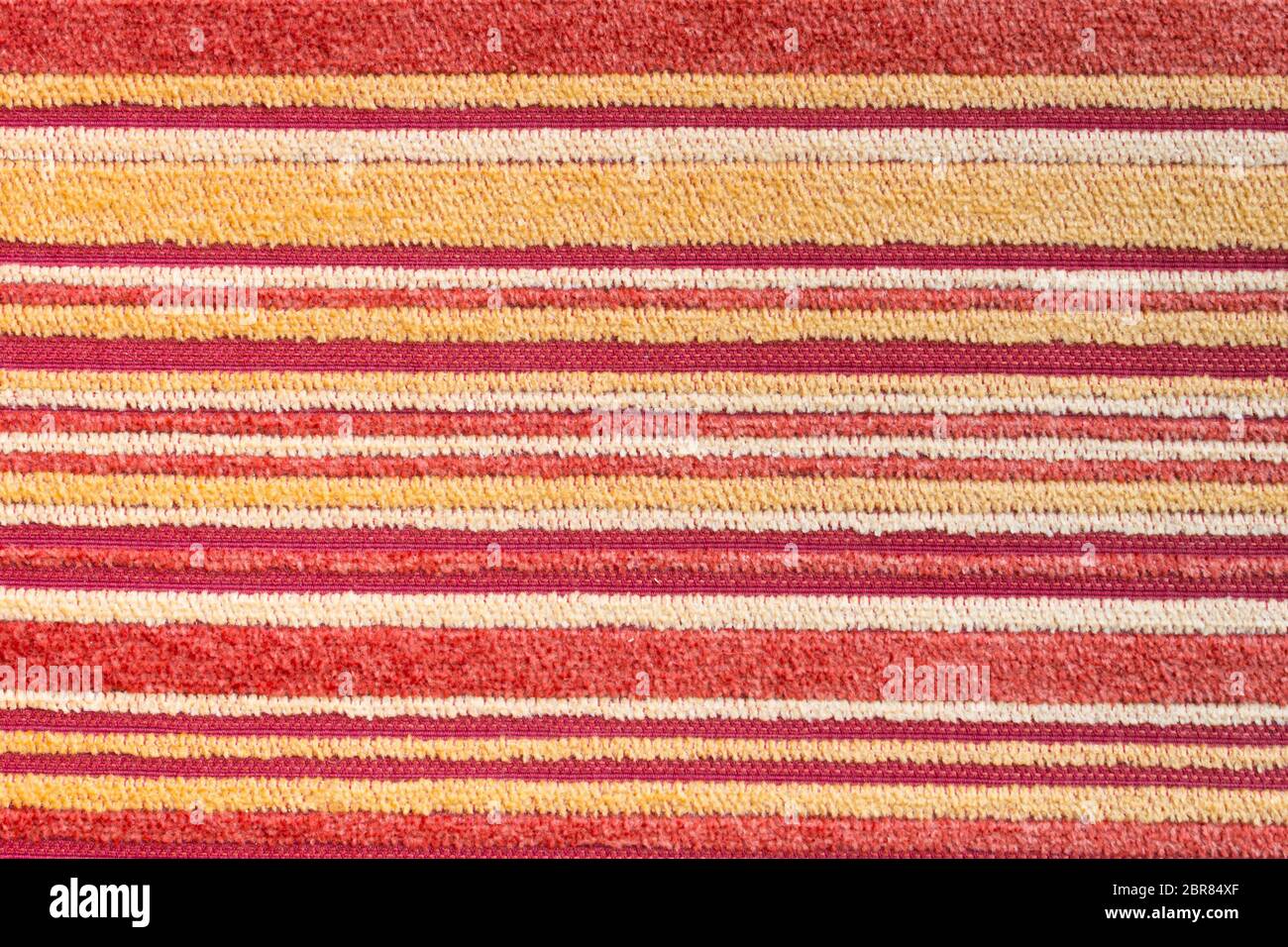Rot Gelb Teppich Textur oder Teppich Hintergrund. Rot Gelb Teppich Textur oder Teppich Hintergrund für Design Stockfoto