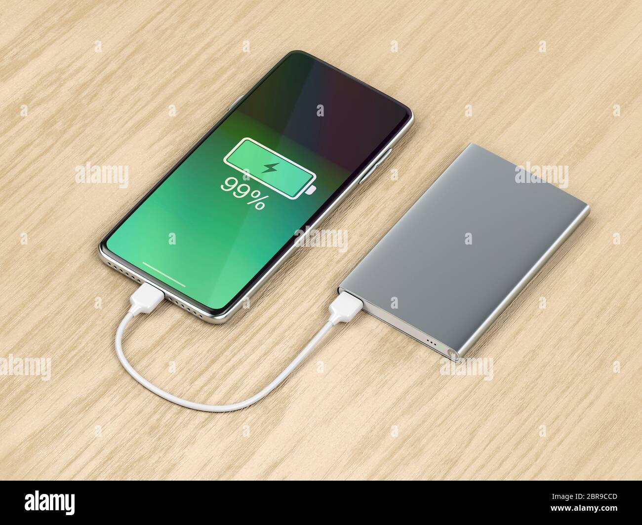 Das Aufladen des Smartphones mit einem Power Bank auf Holz Hintergrund Stockfoto