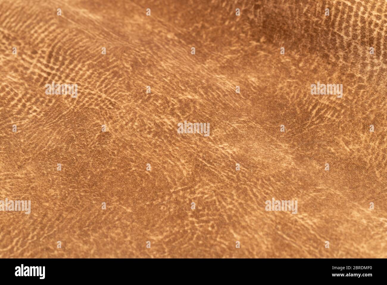 Braunes Wildleder für das Konzept und Stil Idee von feinen Leder Handwerk, handgemachte Arbeitsraum. Hintergrundtextur und Hintergrundbilder. Stockfoto