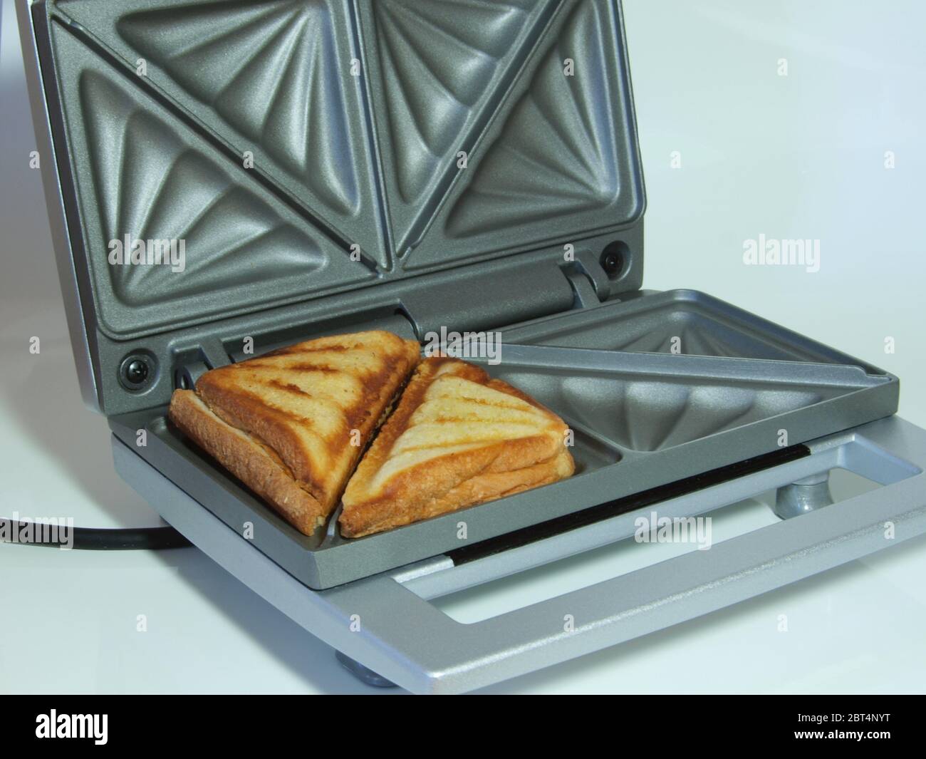 Sandwich Toast gebacken Tackle braun bräunlich Brünette Küche Küche elektrische Stockfoto