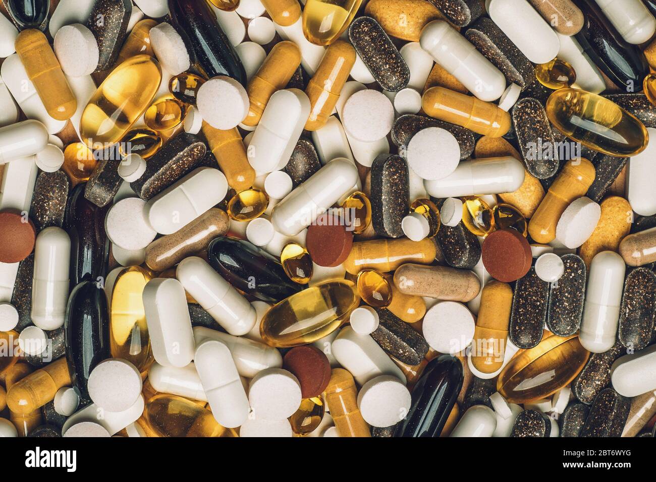 Medikation Hintergrund mit vielen Pillen, Kapseln und Nahrungsergänzungsmittel, Draufsicht. Stockfoto