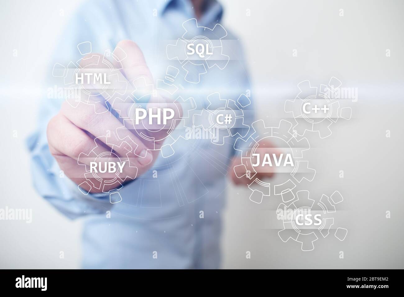 Konzept der Webentwicklungstools auf virtuellem Bildschirm. Programmiersprache und Skripte. PHP, SQL, HTML, Java und andere Stockfoto